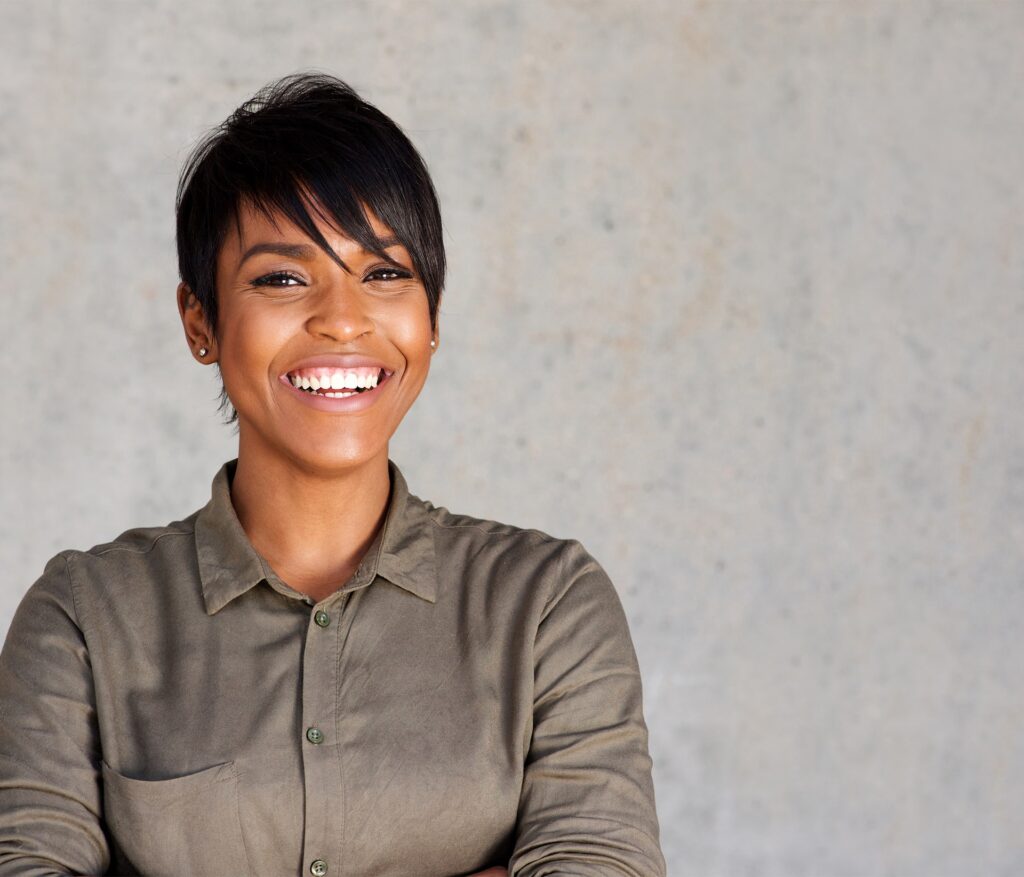 A young professional smiling, ready for the day ahead